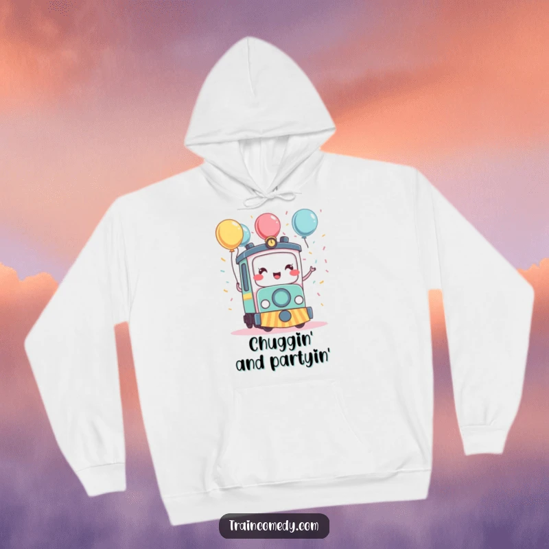 Funny kawaii train character immersed in confetti and balloons, offering comfort and a festive spirit on this warm hoodie.