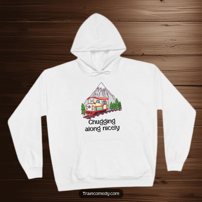 Funny kawaii train character peeking over a mountain peak, designed for comfort and a hint of playful curiosity on this hoodie.