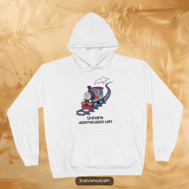 Funny determined train character in a hoodie, chugging uphill with sparkling coal, a cozy and inspiring sweatshirt.
