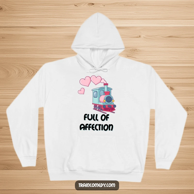 Funny hoodie featuring a Kawaii train car with smoke artfully shaped like hearts trailing behind, perfect for cozy love.