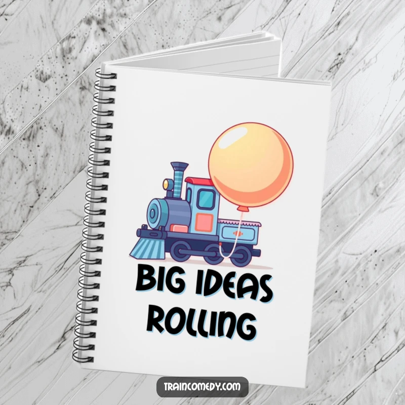Funny notebook cover featuring a train engine with a large, bouncing balloon tied to its front, for notes.