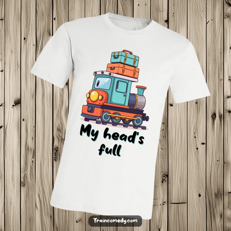 Funny t-shirt featuring a playful train character precariously balancing a stack of tiny suitcases on its roof, showcasing travel humor.
