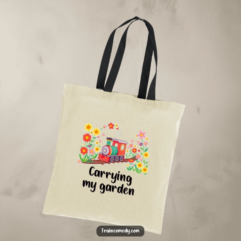 Funny tote bag shows a train happily moving through a flower-filled tunnel, great for market trips or daily errands with a floral theme.