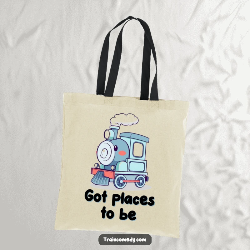 Funny tote bag showcasing a happy cartoon train chugging along with steam, ideal for carrying items with a dose of joy.